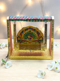 Sigaram Wooden Peacock Meenakari Pooja Jhula – Gold Finish Decorative Swing K5228